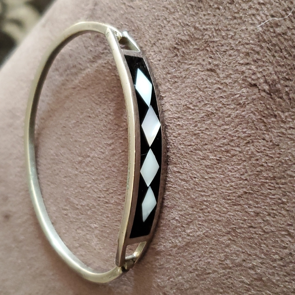 Black stone with white stone design bracelet from Mexico.